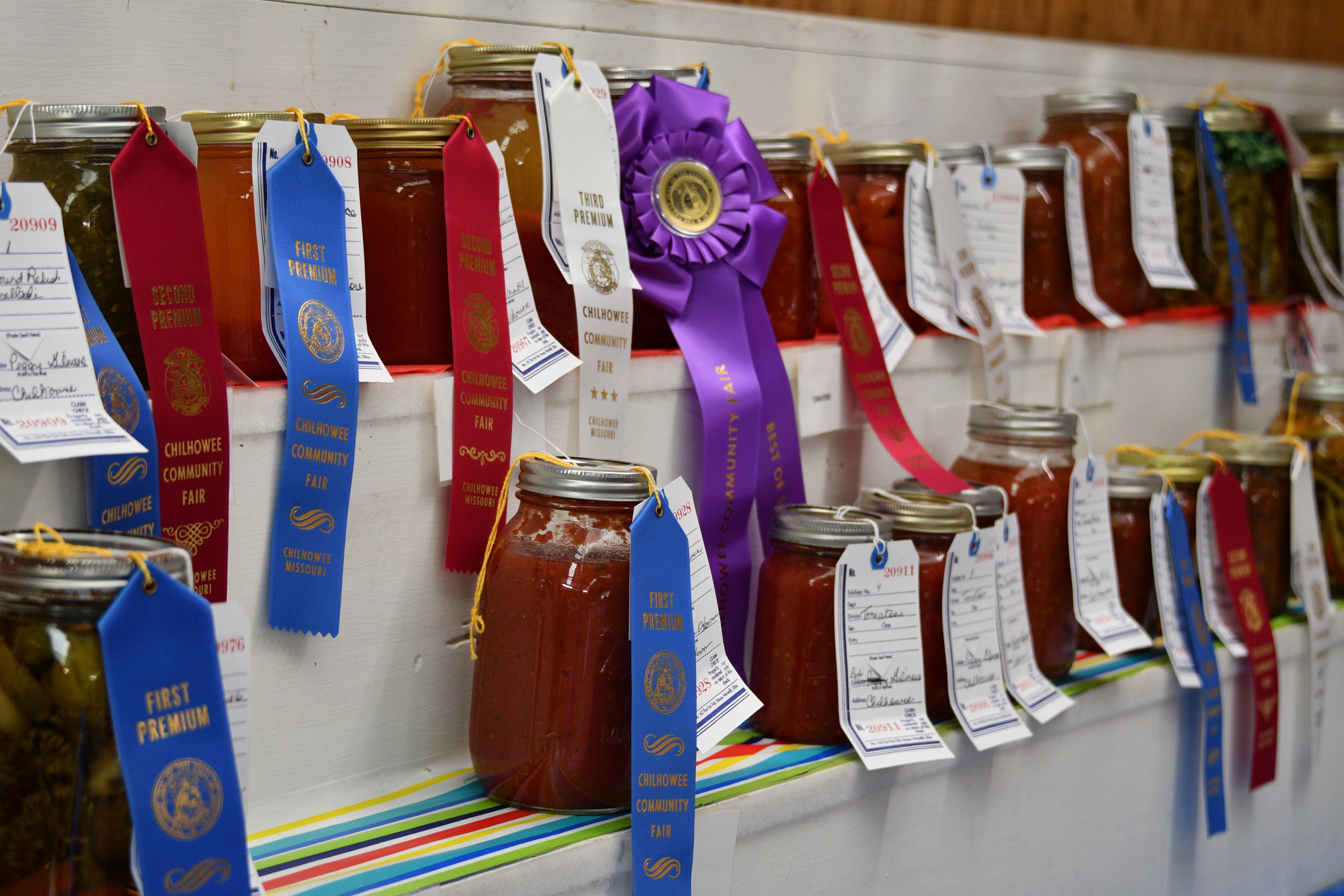 jars of vegetables with ribbons