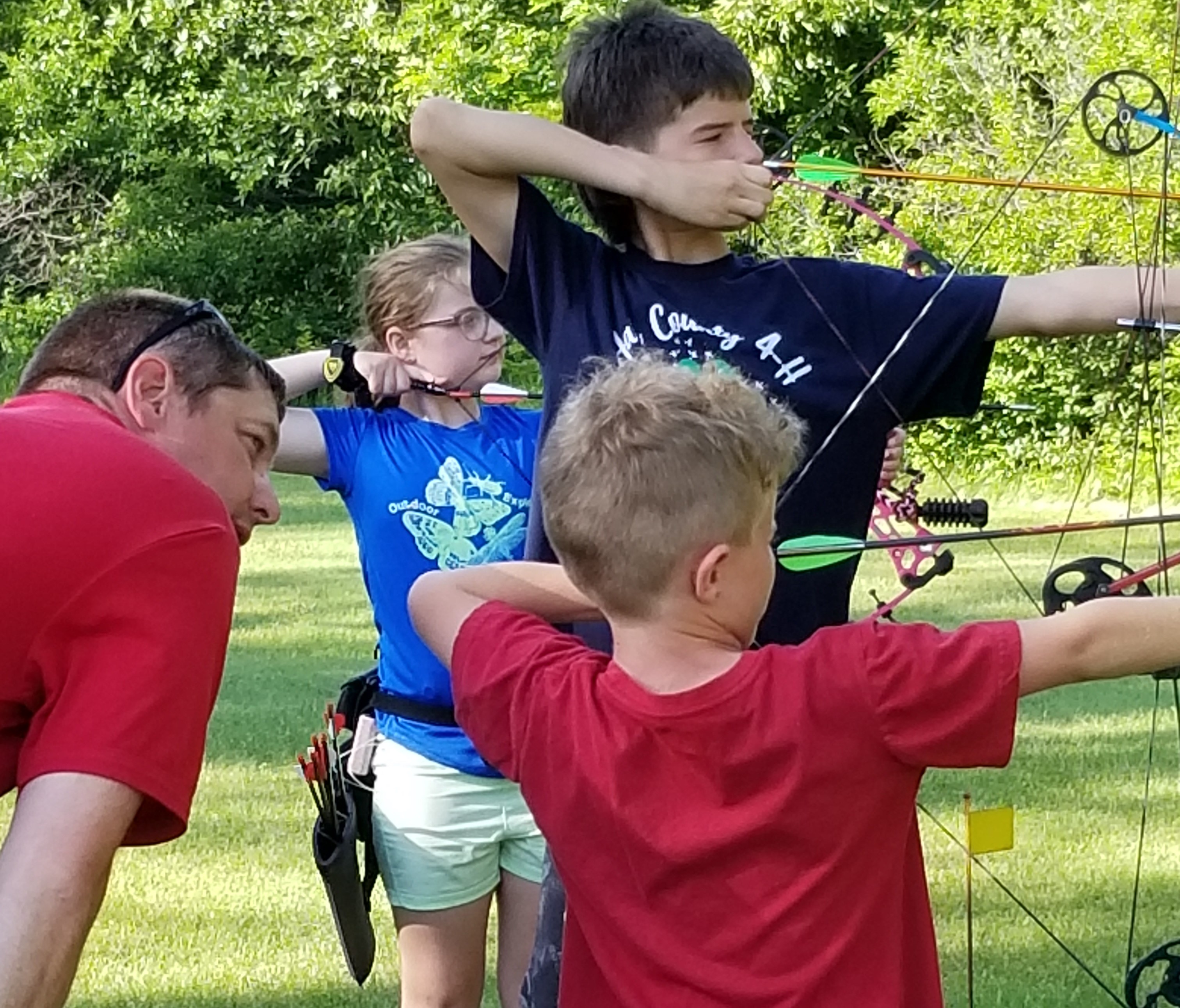 Kids shooting archery