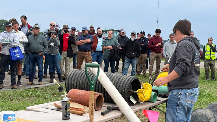 A presenter at the 2025 Expo shares about solutions for blocking tile inlets and other conduits to water in the event of a manure spill.” Photo by Bree Rody