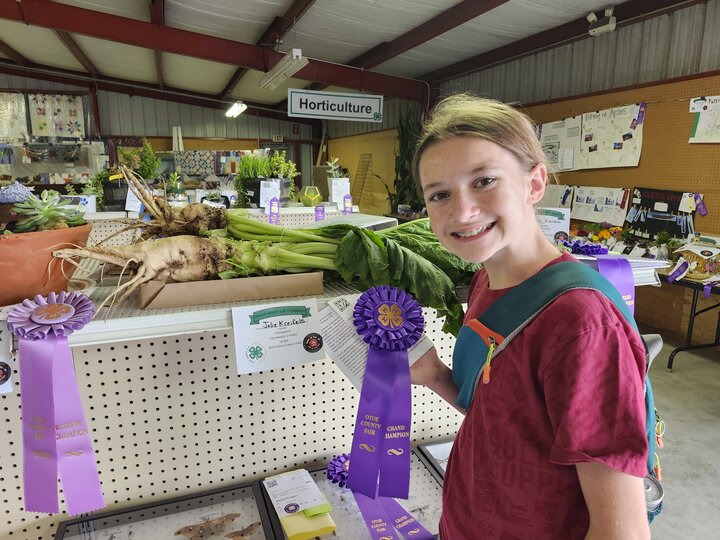 Youth with purple ribbon crop