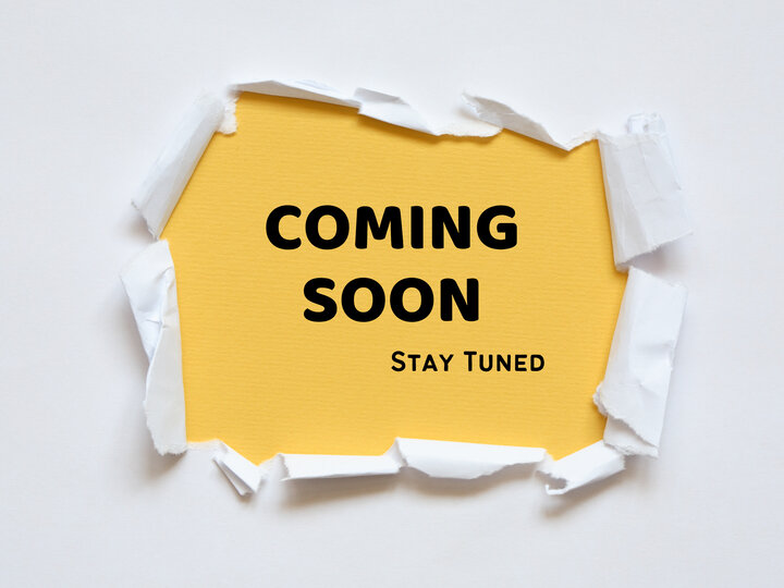 Torn white paper revealing yellow background with "COMING SOON" and "Stay Tuned" text.