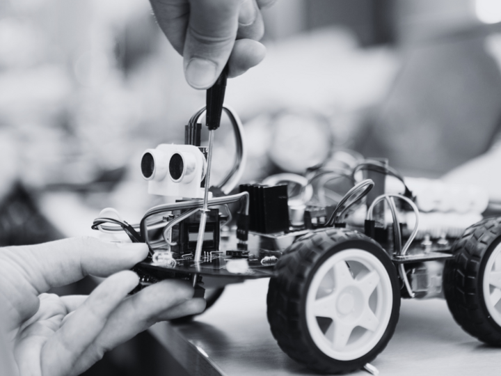 Person working on a robot