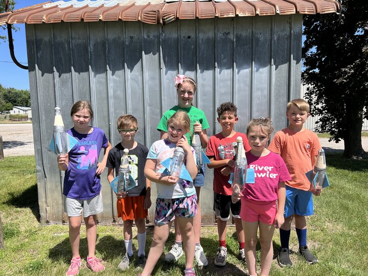 youth with homemade rockets