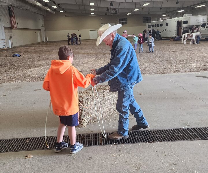 Kid learning how to dummy rope