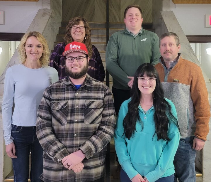 Photo of the 2026 Burt County Extension Board members on the interior stairwell of the Burt County Courthouse. 