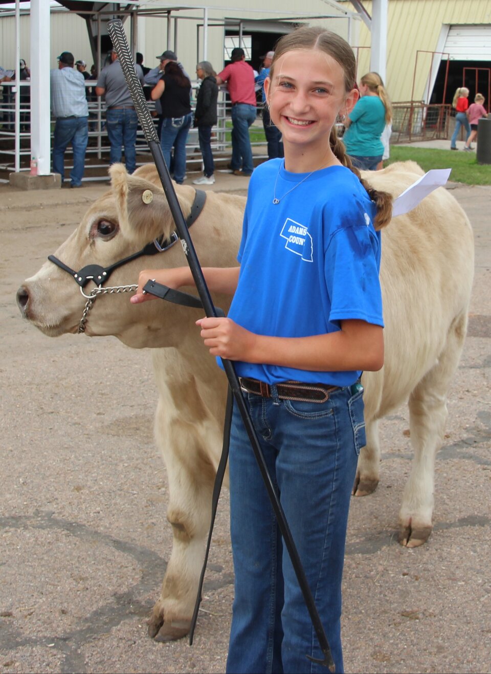 Adams County 4-H Member showing her cream colored beef