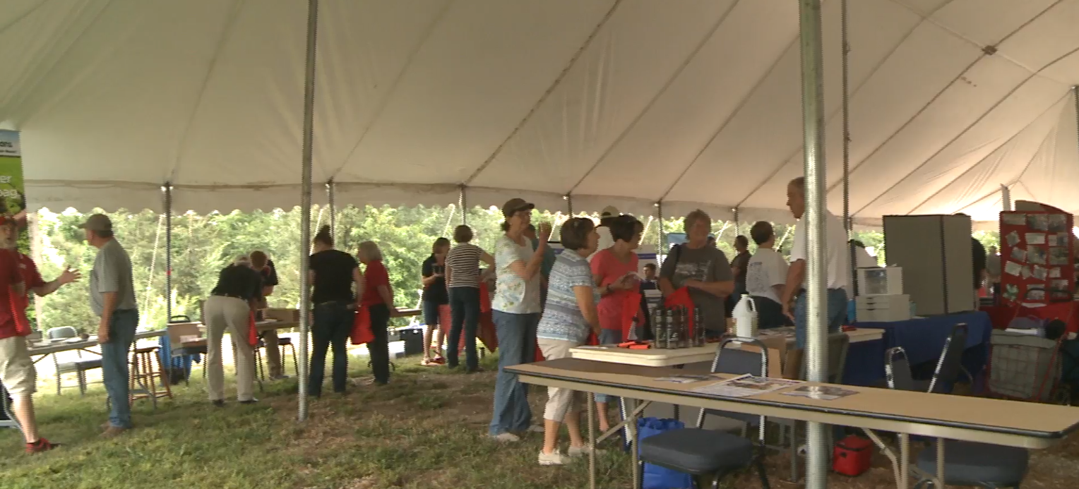 attendees in tent at Haskell Ag Lab Field Day 