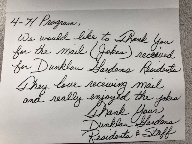 handwritten note saying 'We would like to thank you for the mail received for Dunklow Gardens Residents'